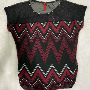 Woman blouse burgundy, white and  black pattern